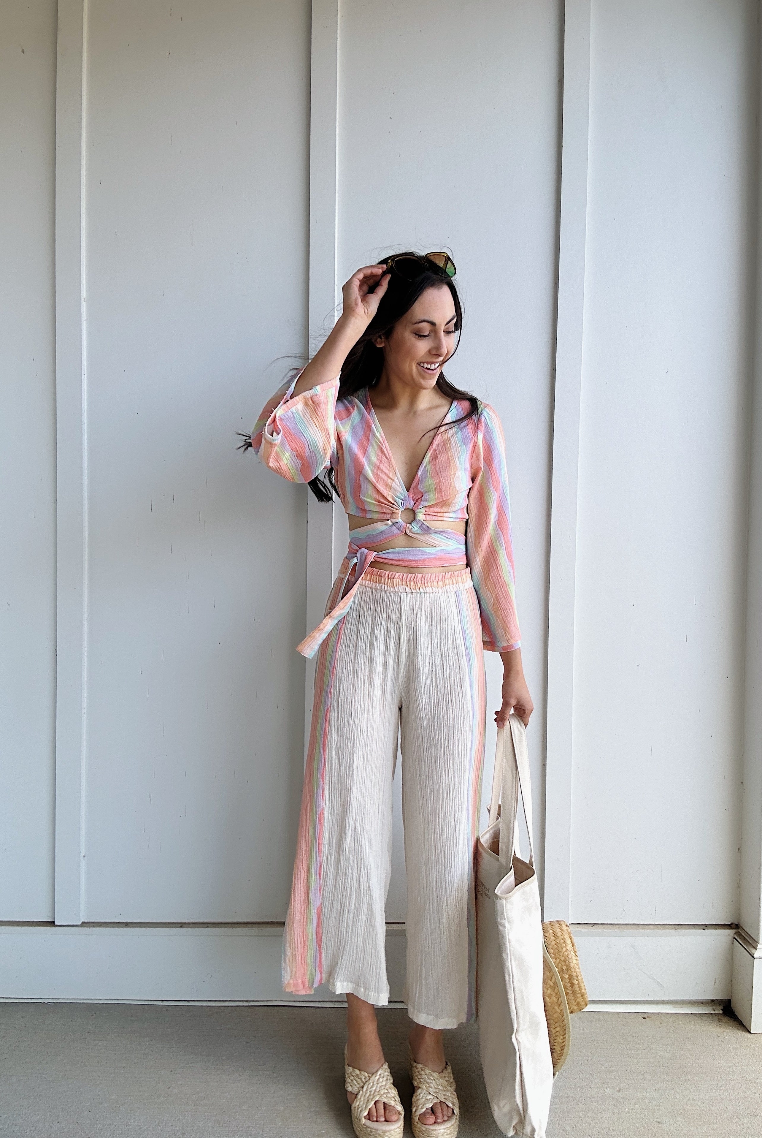 woman wearing colorful beachy outfit