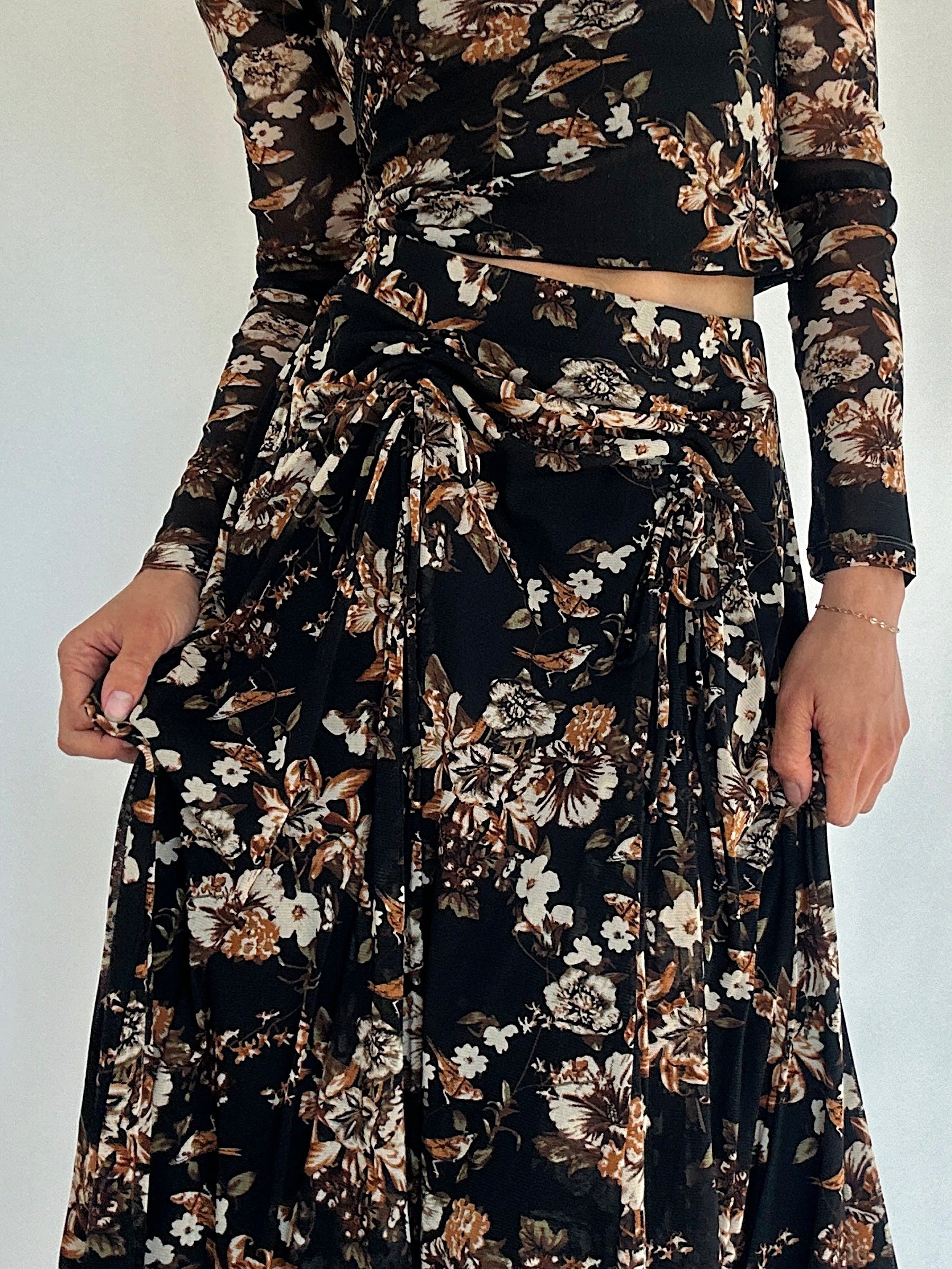 Floral maxi skirt elastic waist with tie detail on a white background