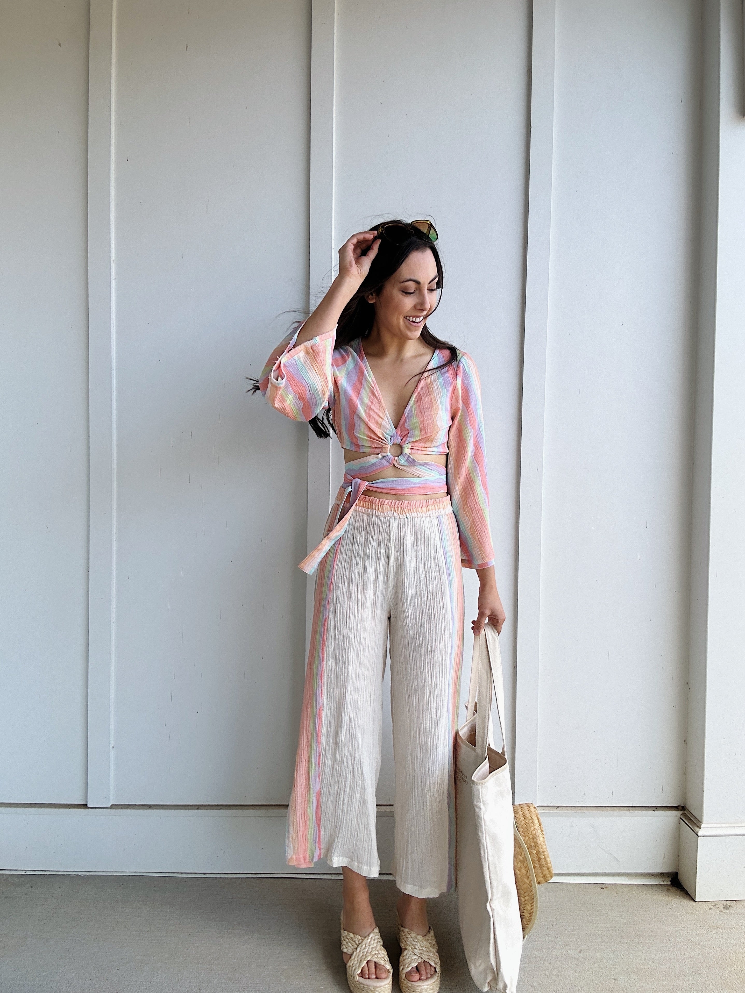woman wearing colorful beachy outfit