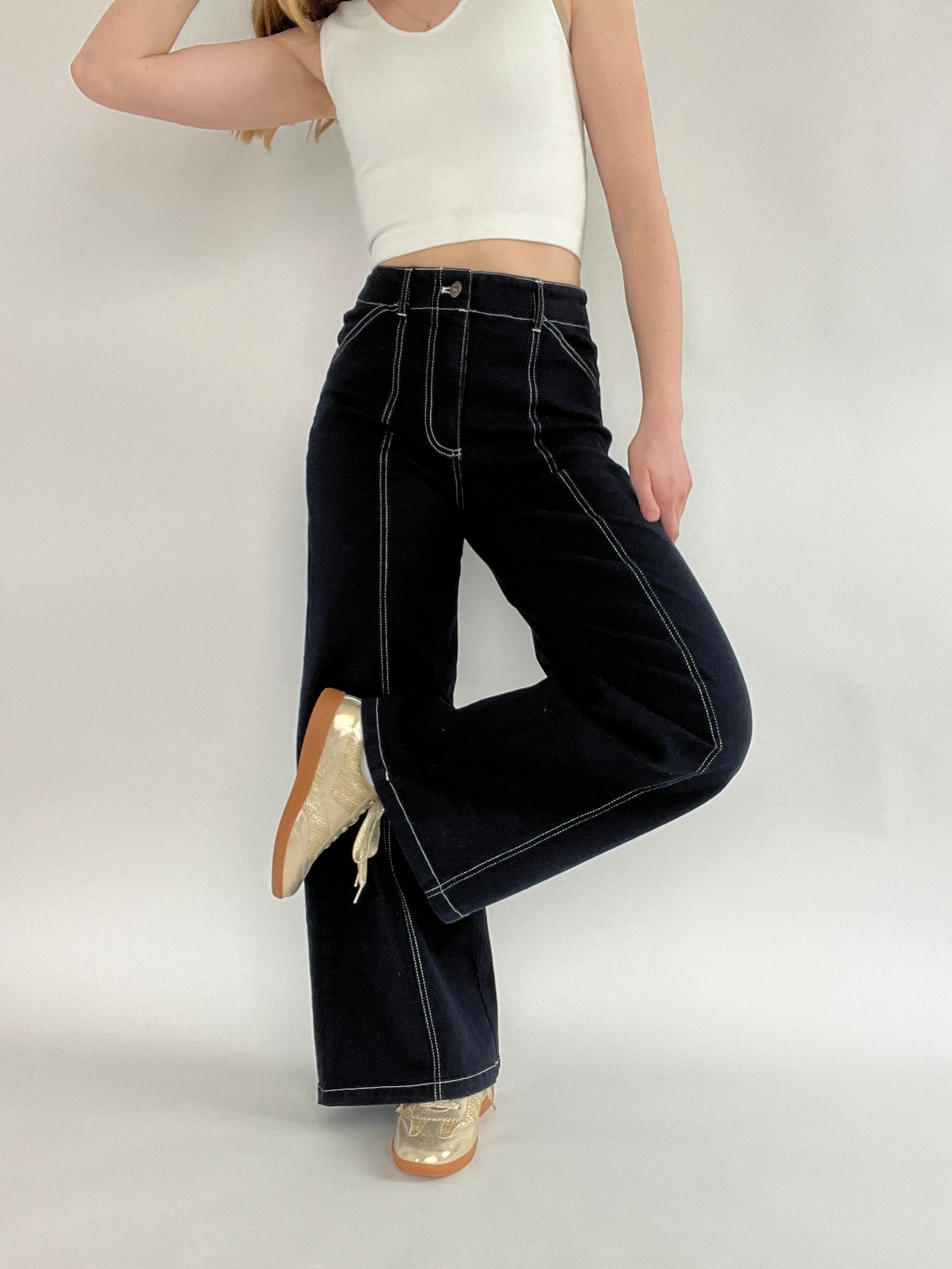 Daybreak Seamed Jeans Legs Crossed