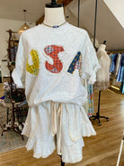 Henderson Ruffle Shorts With USA Top On Mannequin