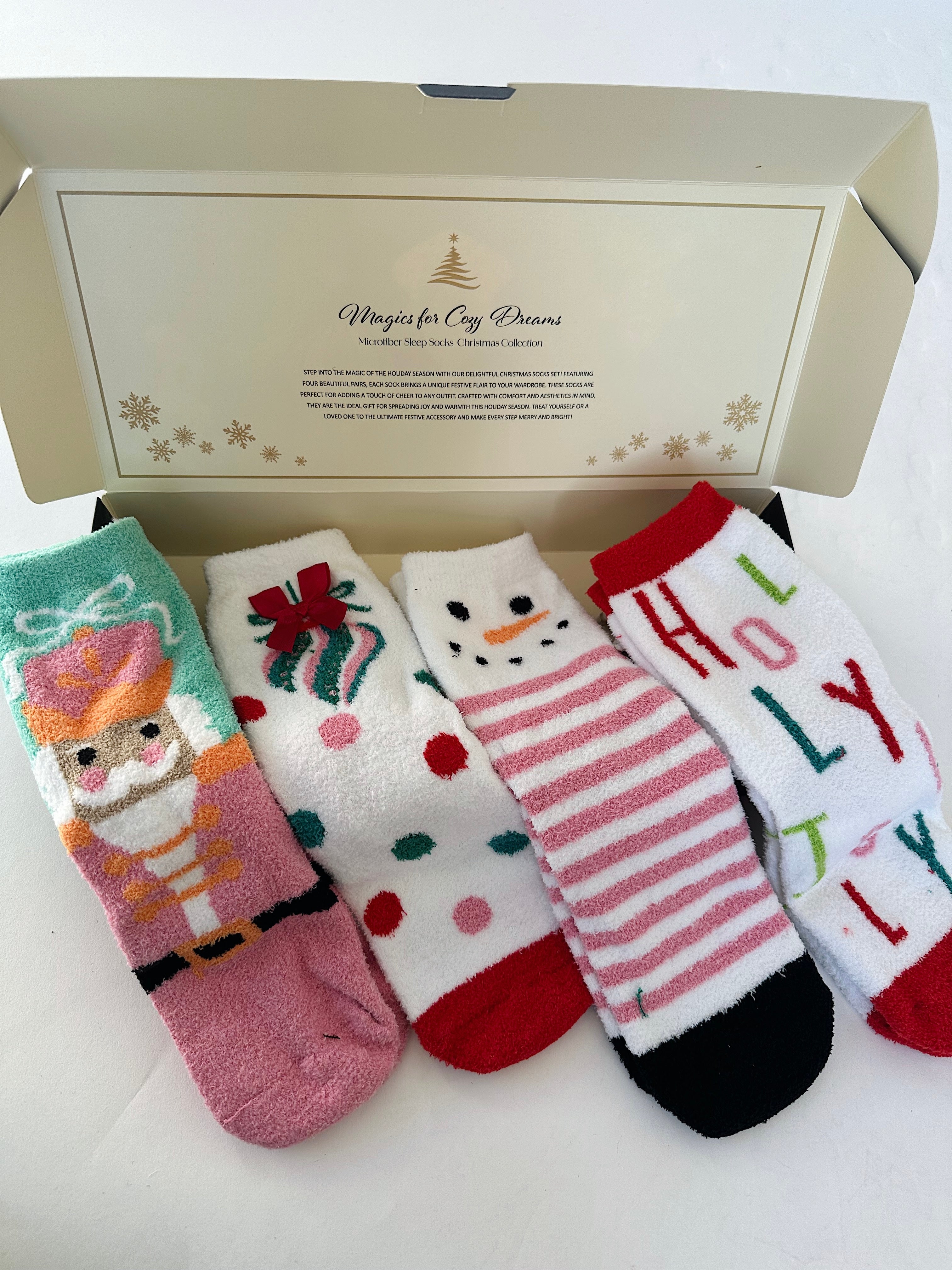 Set of Christmas-themed socks in a decorative box