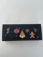 Decorative box with Christmas-themed illustrations on a white background
